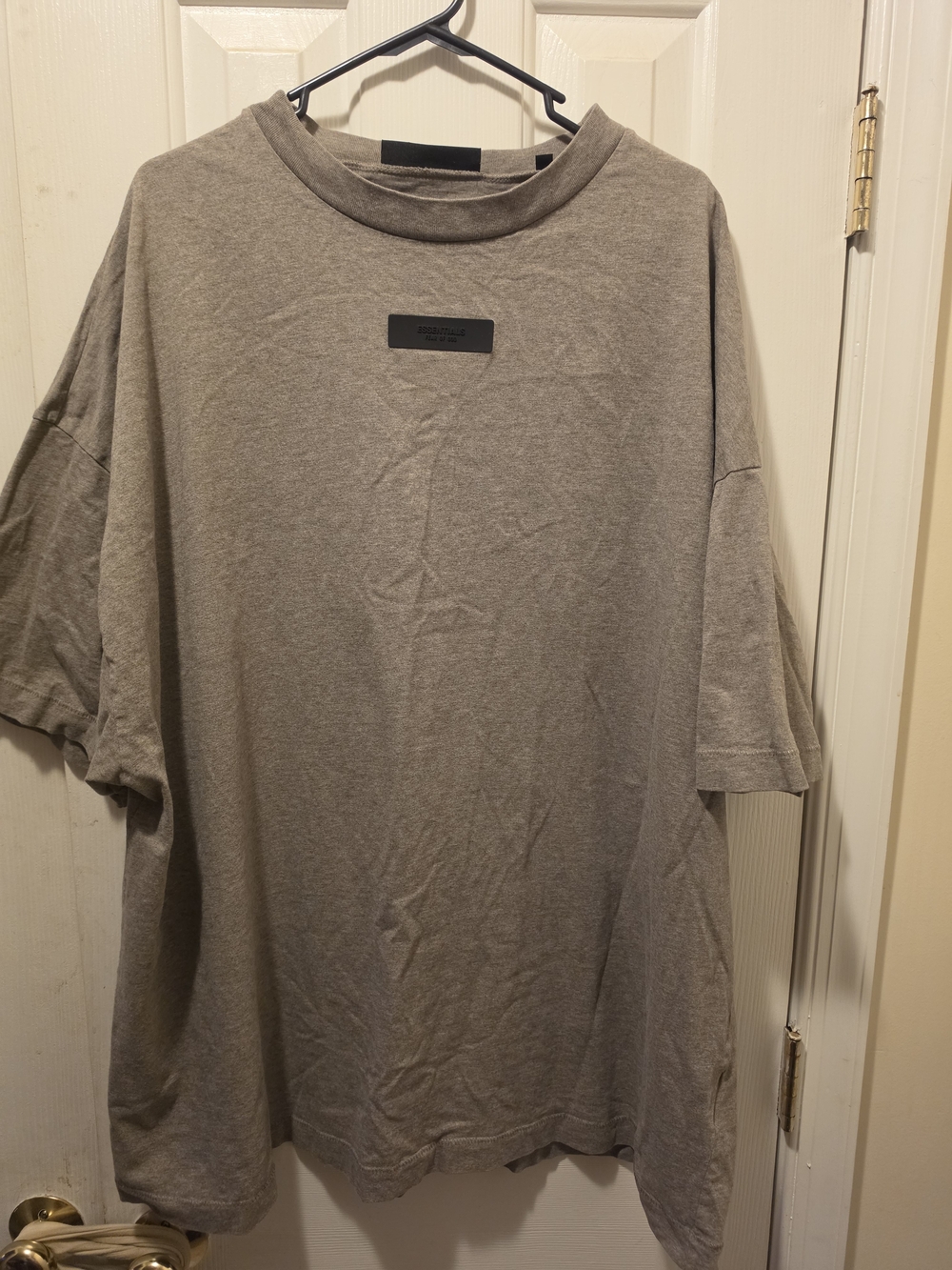 This is a Fear of God Essentials Heather Grey Short-Sleeve Tee